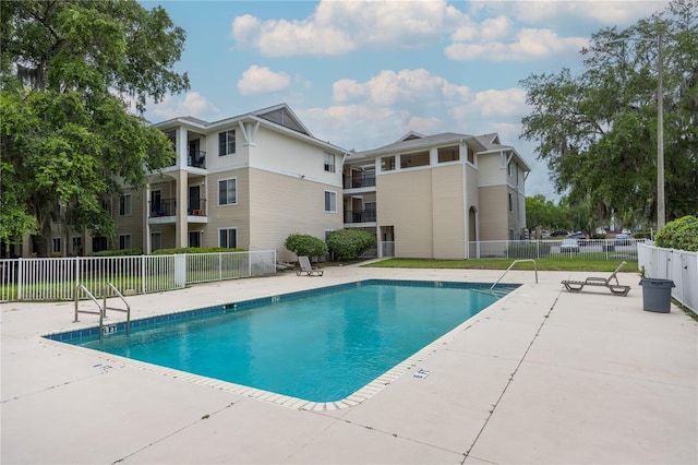 3921 SW 34th St Unit 106, Gainesville, FL 32608 - community pool featuring a patio