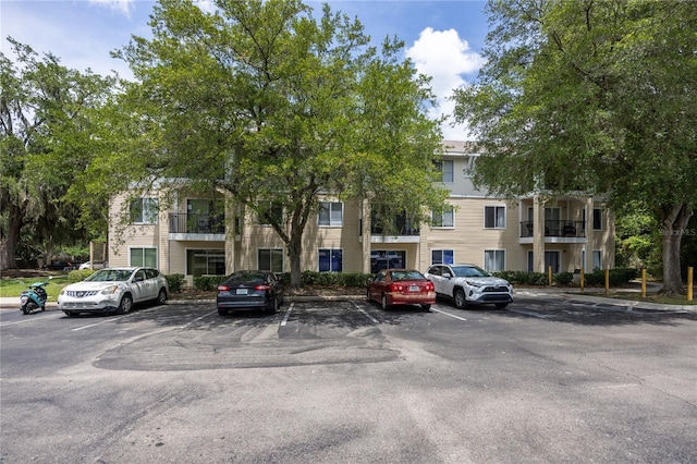 3921 SW 34th St Unit 106, Gainesville, FL 32608 - view of property with uncovered parking