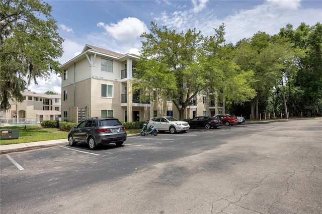 3921 SW 34th St Unit 106, Gainesville, FL 32608 - view of property with uncovered parking