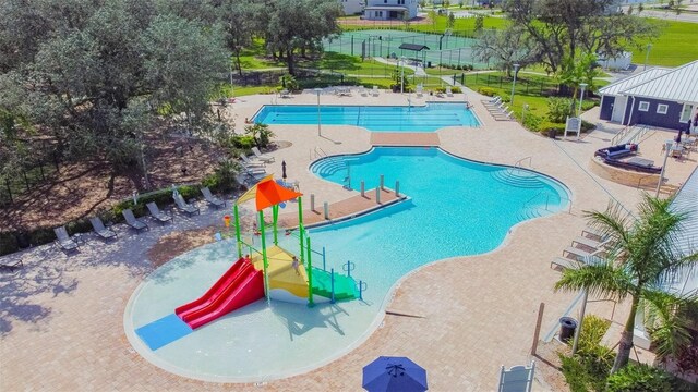 13201 Orca Sound Dr, Riverview, FL 33579 - community pool featuring a patio
