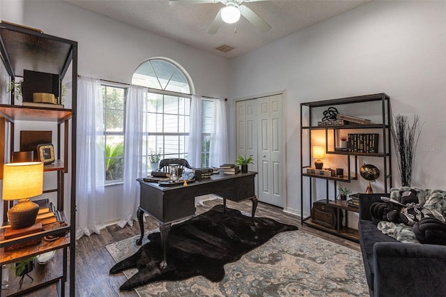 2072 SW 66th Dr, Gainesville, FL 32607 - office space with a ceiling fan and wood finished floors