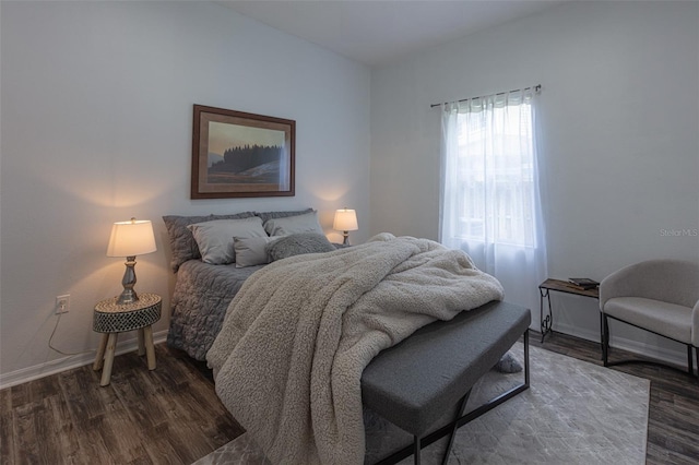 2072 SW 66th Dr, Gainesville, FL 32607 - bedroom with dark wood-style floors and baseboards