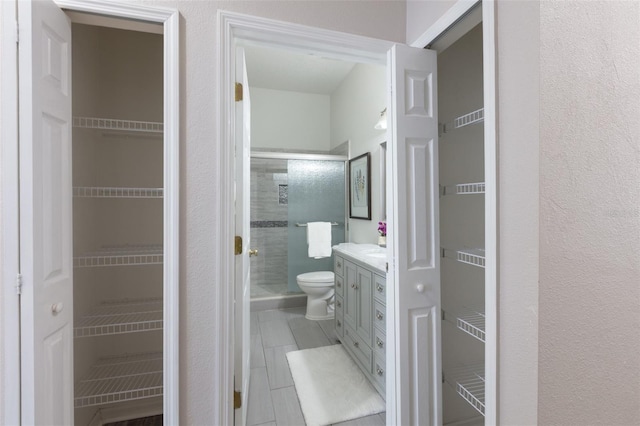 2072 SW 66th Dr, Gainesville, FL 32607 - bathroom featuring vanity and a stall shower