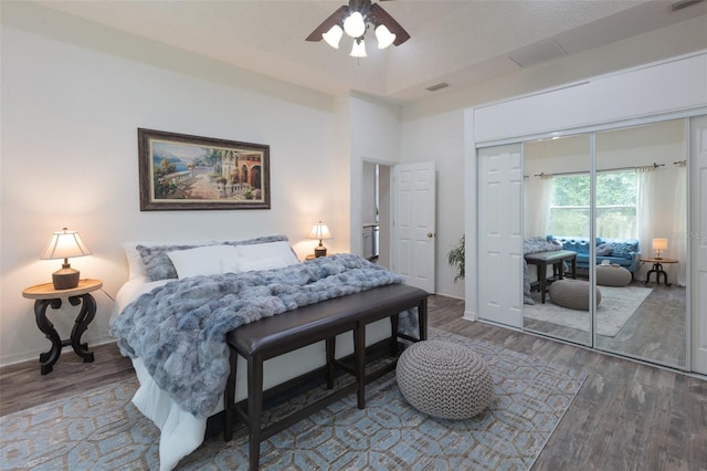 2072 SW 66th Dr, Gainesville, FL 32607 - bedroom featuring wood finished floors, a closet, and ceiling fan
