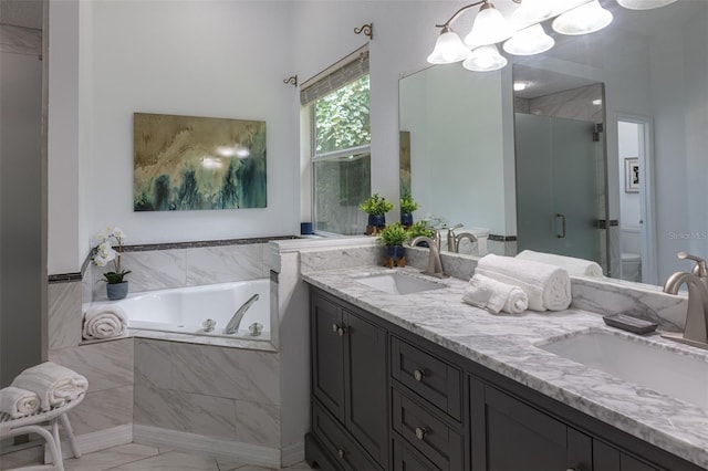 2072 SW 66th Dr, Gainesville, FL 32607 - full bath with a bath, double vanity, marble look tiles, a chandelier, and a stall shower