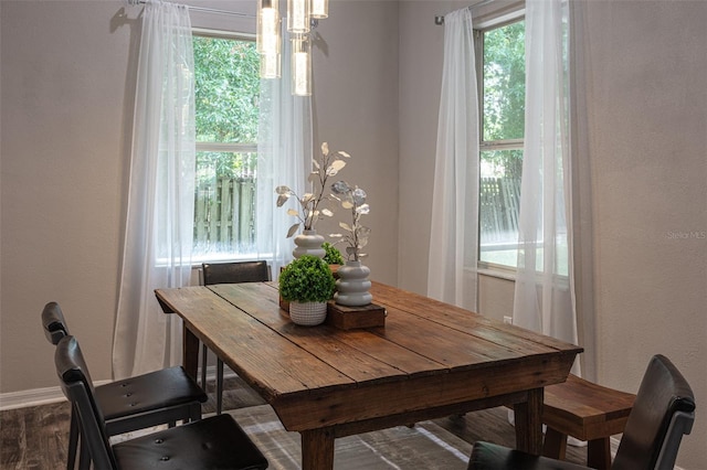 2072 SW 66th Dr, Gainesville, FL 32607 - dining room featuring wood finished floors and baseboards