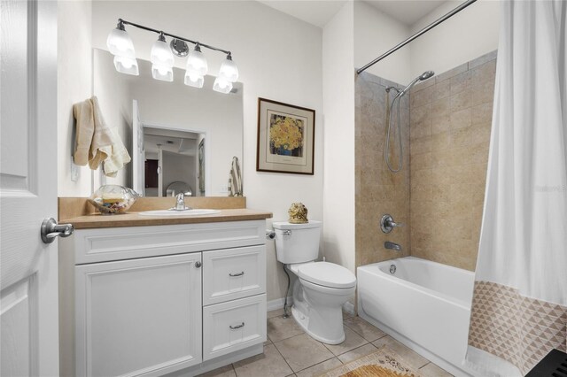 12656 NW 11th Pl, Newberry, FL 32669 - full bathroom featuring tile patterned flooring, toilet, vanity, and shower / tub combo with curtain