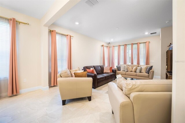 1192 Via Galuppi St, Poinciana, FL 34759 - living area featuring recessed lighting and baseboards