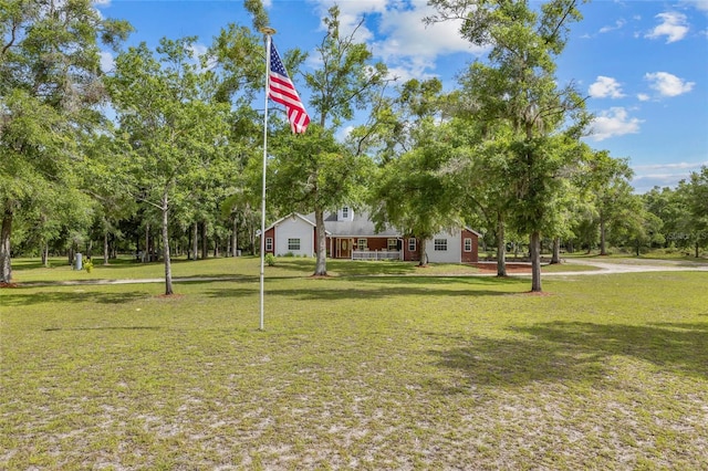 1827 SW Shiloh St, Fort White, FL 32038 - view of grassy yard featuring view of wooded area