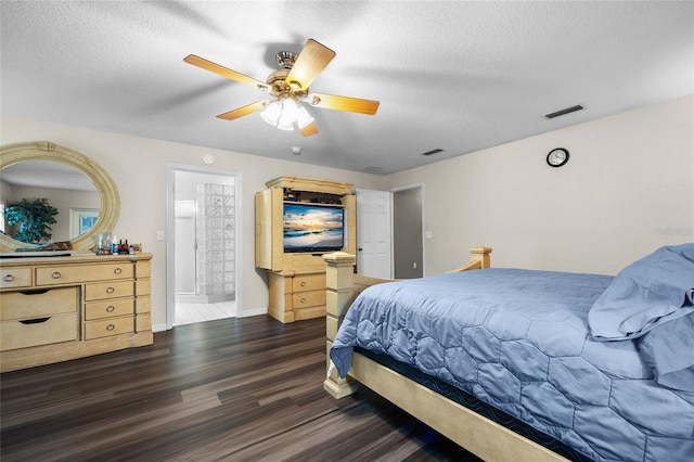 1827 SW Shiloh St, Fort White, FL 32038 - bedroom with wood finished floors, baseboards, a textured ceiling, and a ceiling fan