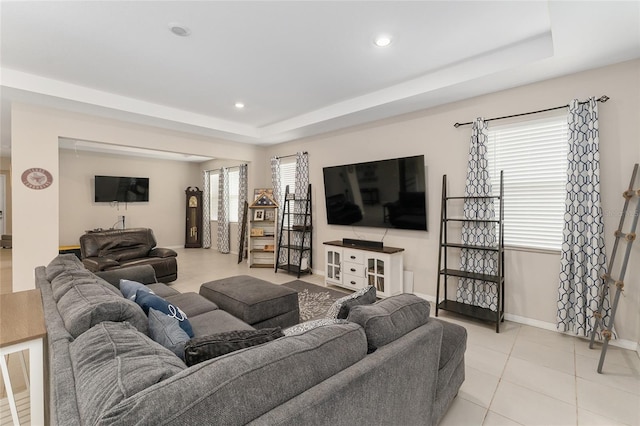 8123 SW 57th Ct, Ocala, FL 34476 - living area featuring a raised ceiling, baseboards, light tile patterned flooring, and recessed lighting