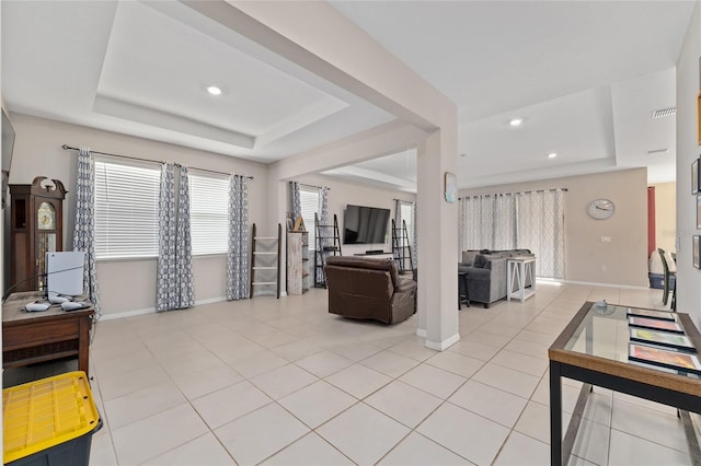 8123 SW 57th Ct, Ocala, FL 34476 - living area with a tray ceiling, baseboards, light tile patterned floors, and recessed lighting