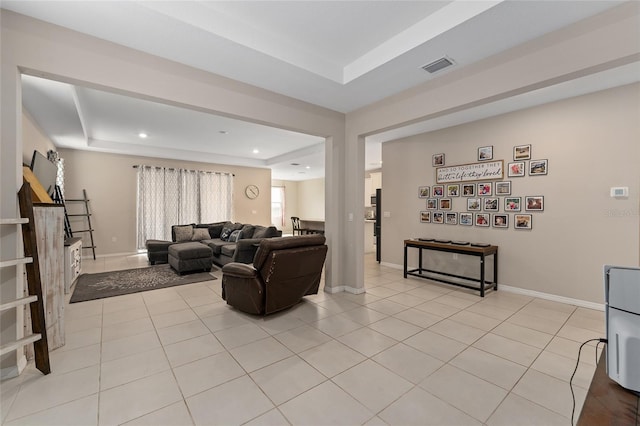 8123 SW 57th Ct, Ocala, FL 34476 - living area featuring a raised ceiling, light tile patterned floors, recessed lighting, and baseboards