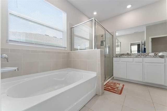 8123 SW 57th Ct, Ocala, FL 34476 - full bathroom featuring a bath, vanity, a shower stall, tile patterned flooring, and recessed lighting