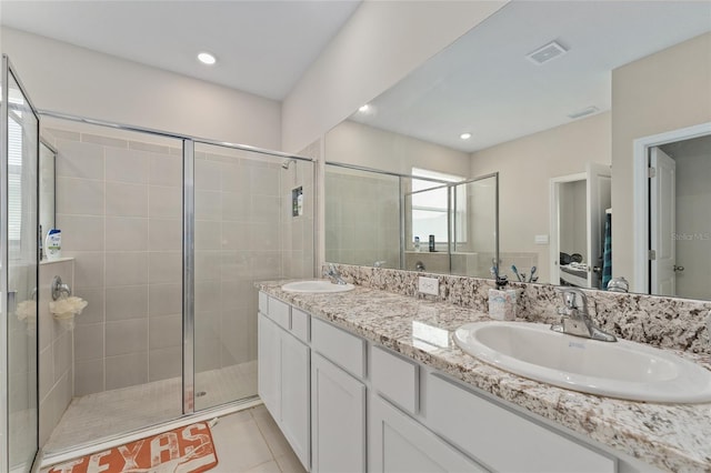 8123 SW 57th Ct, Ocala, FL 34476 - bathroom featuring a shower stall, double vanity, tile patterned floors, and recessed lighting