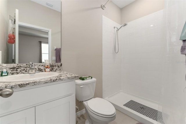 8123 SW 57th Ct, Ocala, FL 34476 - full bathroom with toilet, tiled shower, vanity, and tile patterned floors