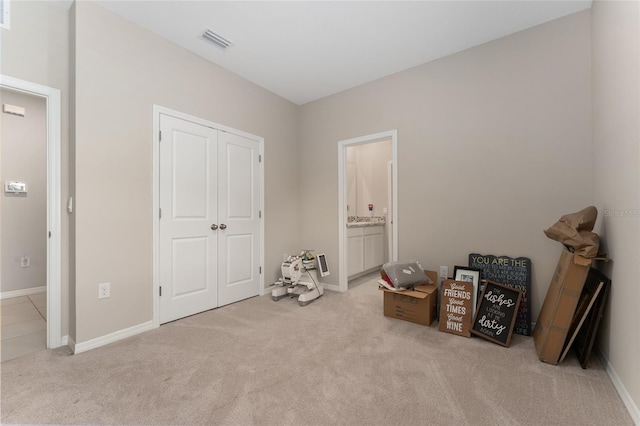 8123 SW 57th Ct, Ocala, FL 34476 - carpeted bedroom with baseboards and a closet