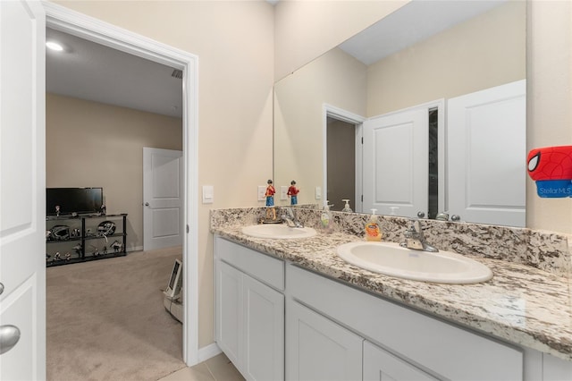 8123 SW 57th Ct, Ocala, FL 34476 - bathroom with double vanity and baseboards