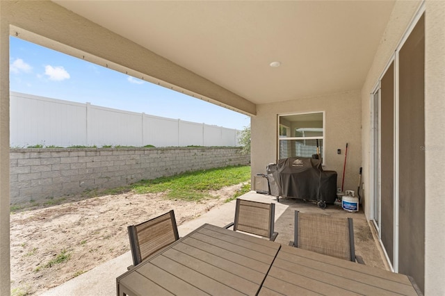 8123 SW 57th Ct, Ocala, FL 34476 - deck featuring a patio area, outdoor dining area, a fenced backyard, and area for grilling