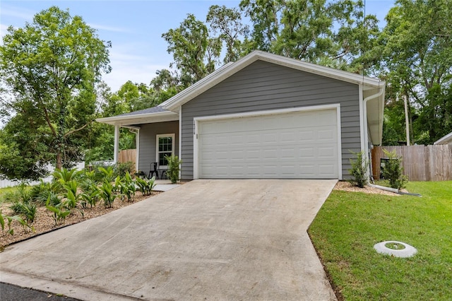 14214 NW 154th Pl, Alachua, FL 32615 - view of front of property featuring driveway and a garage