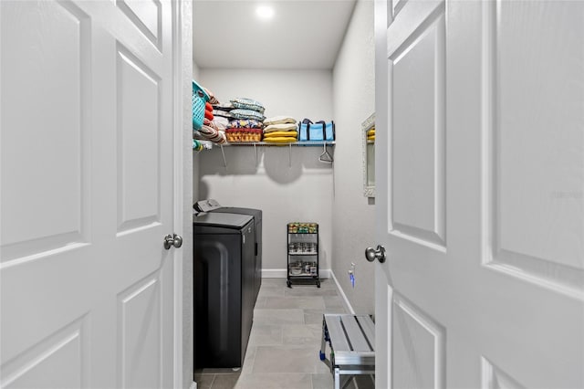 14214 NW 154th Pl, Alachua, FL 32615 - washroom with washer and dryer and baseboards