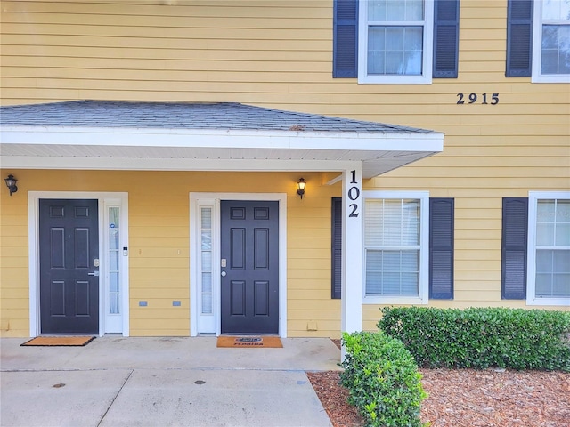 2915 SW 35th Pl Unit 102, Gainesville, FL 32608 - entrance to property with a shingled roof
