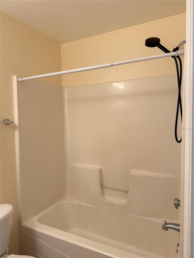 2915 SW 35th Pl Unit 102, Gainesville, FL 32608 - bathroom featuring bathtub / shower combination