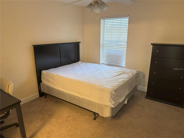 2915 SW 35th Pl Unit 102, Gainesville, FL 32608 - carpeted bedroom featuring baseboards