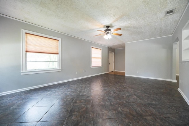 1404 NW 10th Ave, Gainesville, FL 32605 - unfurnished room featuring a ceiling fan, a textured ceiling, and crown molding