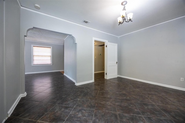 1404 NW 10th Ave, Gainesville, FL 32605 - spare room featuring ornamental molding, a chandelier, and a smoke detector