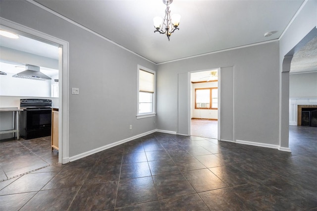 1404 NW 10th Ave, Gainesville, FL 32605 - empty room featuring crown molding, a chandelier, a smoke detector, and dark tile patterned floors