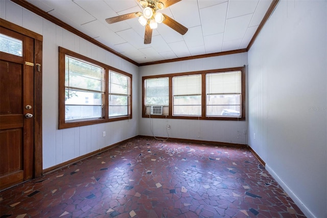 1404 NW 10th Ave, Gainesville, FL 32605 - empty room with ornamental molding, healthy amount of natural light, ceiling fan, cooling unit, and wood walls