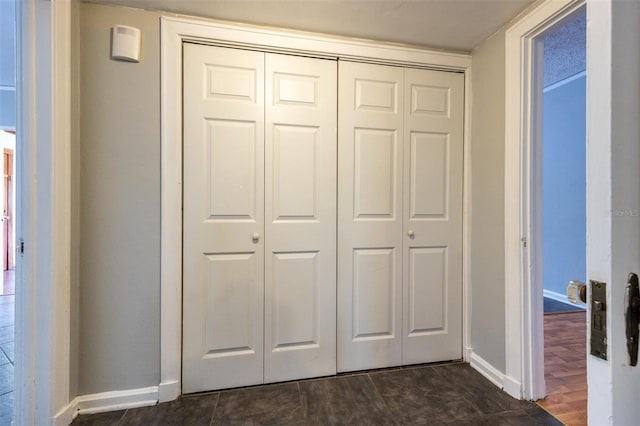 1404 NW 10th Ave, Gainesville, FL 32605 - unfurnished bedroom featuring baseboards and a closet