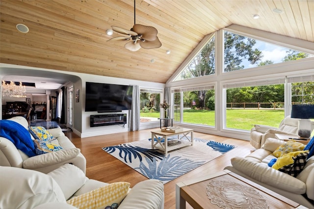 518 SW Little Rd, Lake City, FL 32024 - living area featuring high vaulted ceiling, wooden ceiling, ceiling fan, a chandelier, and wood finished floors