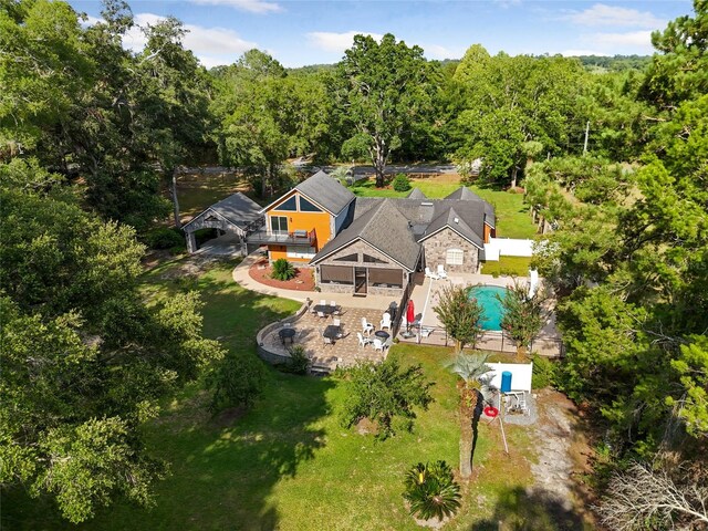 518 SW Little Rd, Lake City, FL 32024 - view from above of property with a pool and a heavily wooded area