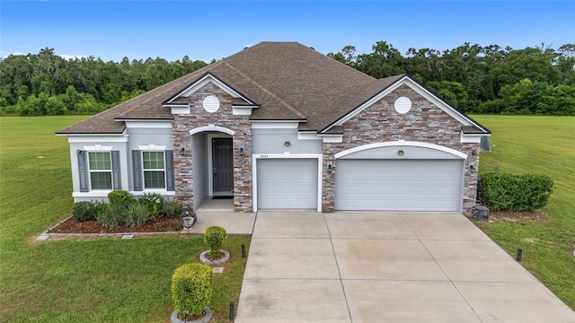 5604 SW 215th Ter, Newberry, FL 32669 - view of front of house with roof with shingles, a front lawn, an attached garage, and concrete driveway