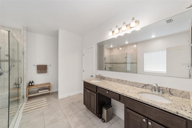 5604 SW 215th Ter, Newberry, FL 32669 - full bath featuring a stall shower, double vanity, and tile patterned flooring