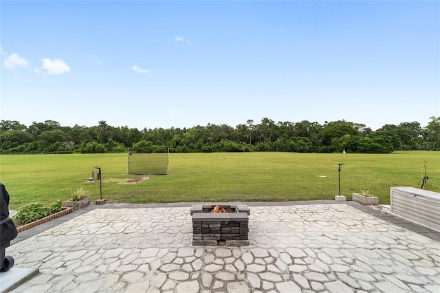 5604 SW 215th Ter, Newberry, FL 32669 - view of patio / terrace with an outdoor fire pit