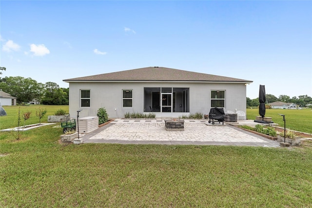 5604 SW 215th Ter, Newberry, FL 32669 - rear view of property featuring a patio area, a lawn, stucco siding, and a fire pit