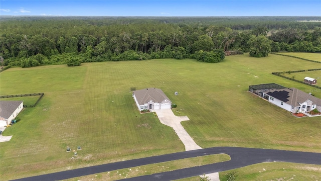 5604 SW 215th Ter, Newberry, FL 32669 - aerial view of property and surrounding area featuring a heavily wooded area