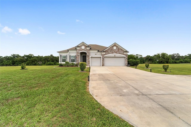 5604 SW 215th Ter, Newberry, FL 32669 - view of front of property featuring a garage, concrete driveway, a front lawn, and stone siding