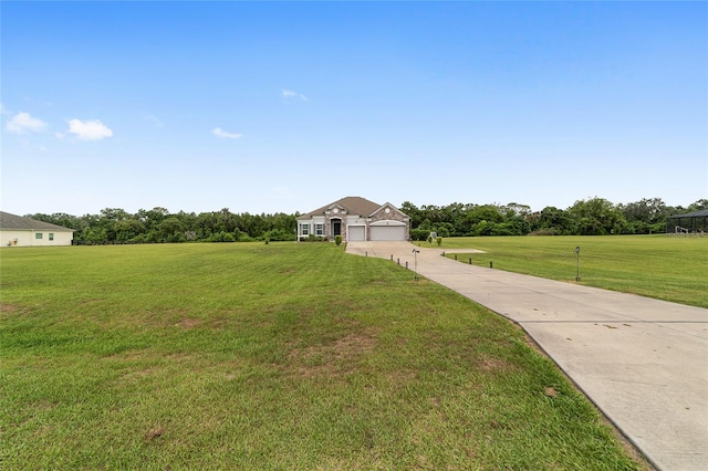 5604 SW 215th Ter, Newberry, FL 32669 - view of front of property with driveway and a front yard