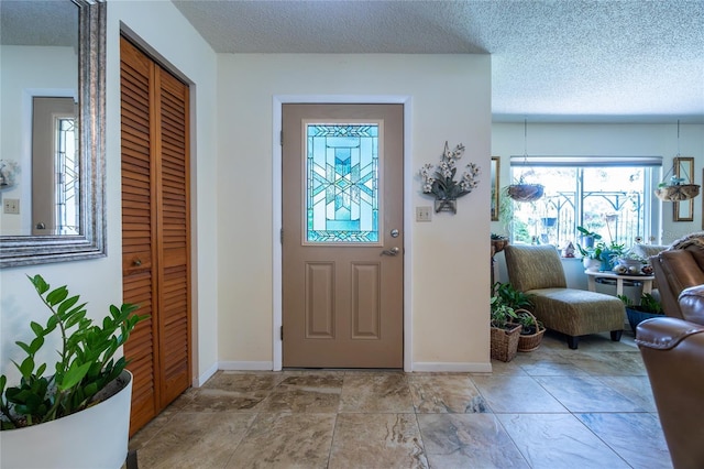 261 Ishie Ave, Bronson, FL 32621 - foyer with a textured ceiling