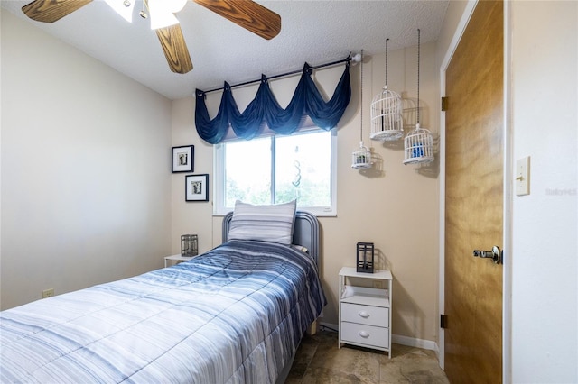 261 Ishie Ave, Bronson, FL 32621 - bedroom with ceiling fan and baseboards