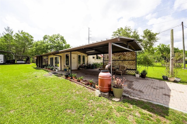261 Ishie Ave, Bronson, FL 32621 - view of patio / terrace featuring french doors