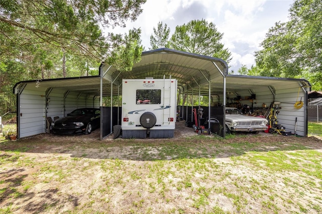 261 Ishie Ave, Bronson, FL 32621 - view of vehicle parking with a detached carport