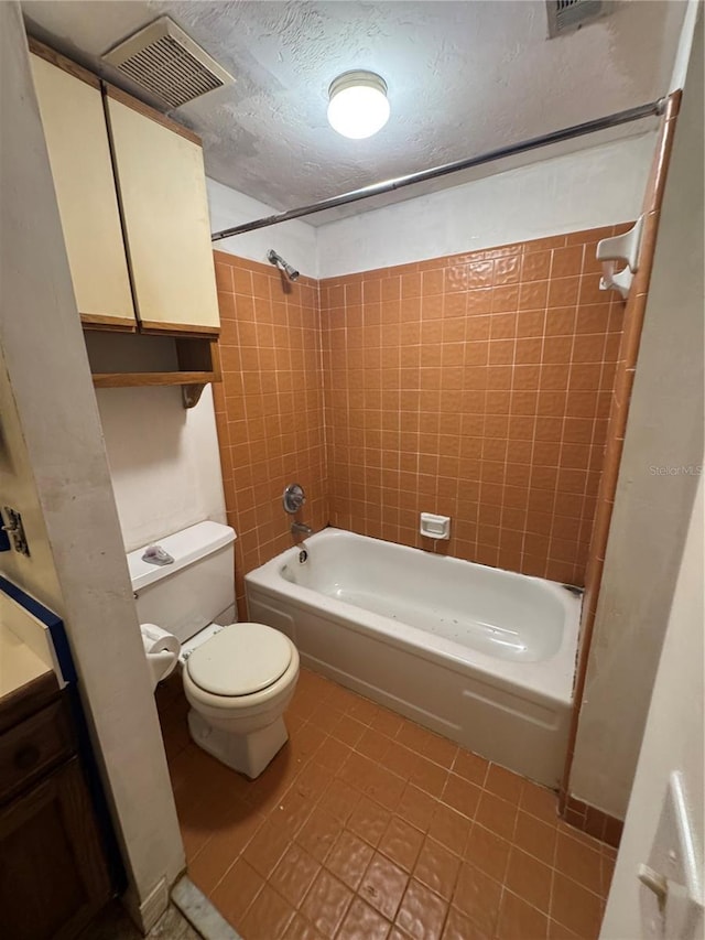 1515 NW 29th Rd Unit E3, Gainesville, FL 32605 - bathroom featuring toilet and bathtub / shower combination