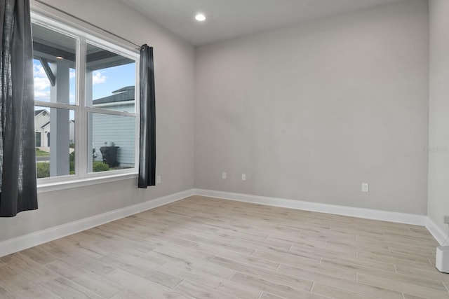 3520 SW 120th Dr, Gainesville, FL 32608 - spare room featuring plenty of natural light, light wood finished floors, and recessed lighting