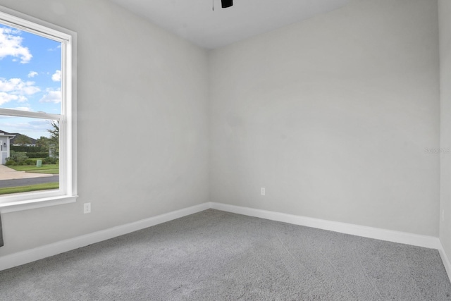 3520 SW 120th Dr, Gainesville, FL 32608 - carpeted spare room with baseboards and ceiling fan