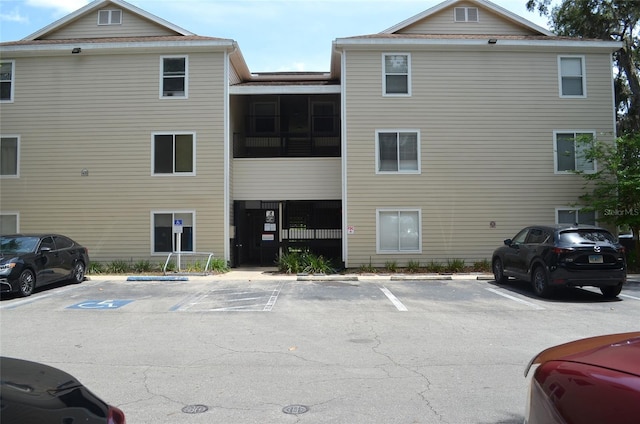 3800 SW 20th Ave Unit 405, Gainesville, FL 32607 - view of property with uncovered parking
